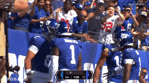A Football Game Is Being Played On Cbs Sports And The Score Is 34 To 1 GIF