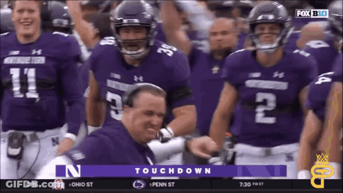 A Football Game Is Being Played On Fox GIF
