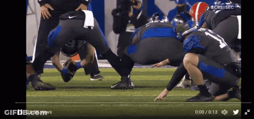 A Football Game Is Being Played On The Cbs Sec Channel GIF