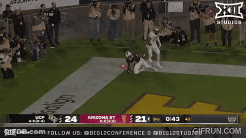 A Football Game Is Being Shown On The X11 Studios Network GIF