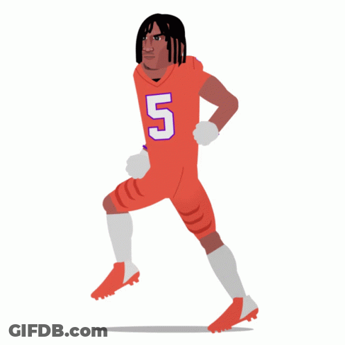 A Football Is Being Kicked By A Person Wearing Orange Socks GIF