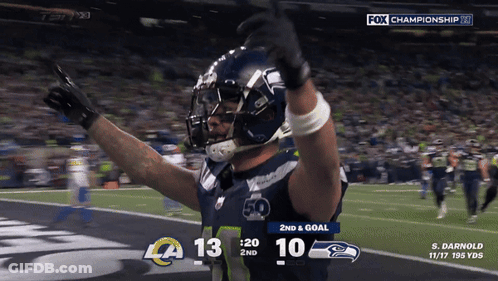 A Football Player Celebrates A Touchdown During A Fox Championship Game GIF