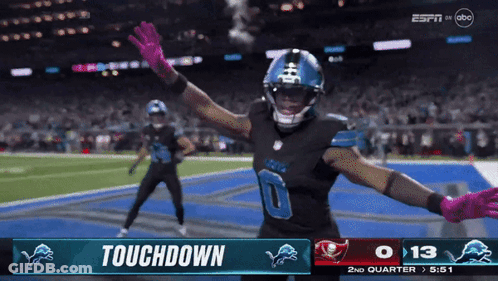 A Football Player Celebrates A Touchdown During A Game On Espn GIF
