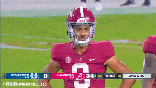 A Football Player For Alabama Stands On The Field GIF