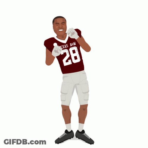 A Football Player From Texas A & M Stands In Front Of Fireworks GIF