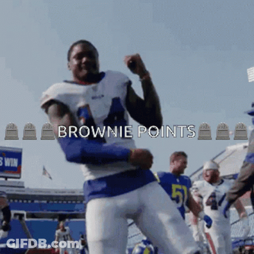 A Football Player In A Blue And White Uniform With The Words Brownie Points Above Him GIF