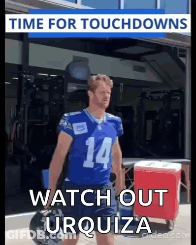 A Football Player In A Blue Jersey With The Number 14 On The Front GIF
