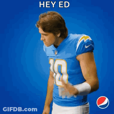 A Football Player In A Blue Jersey With The Number 5 On It GIF