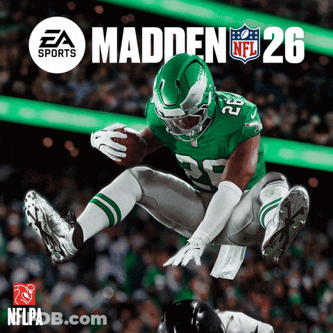 A Football Player In A Green Uniform With The Number 26 On It GIF