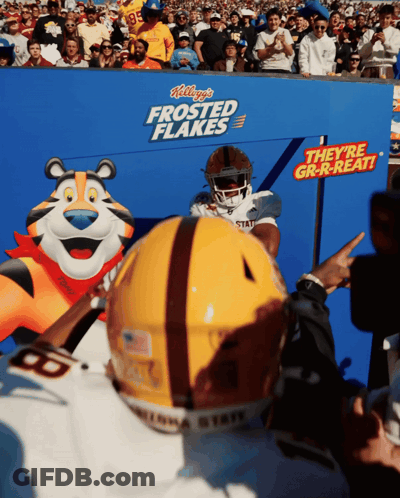 A Football Player In A Kellogg 'S Frosted Flakes Uniform GIF