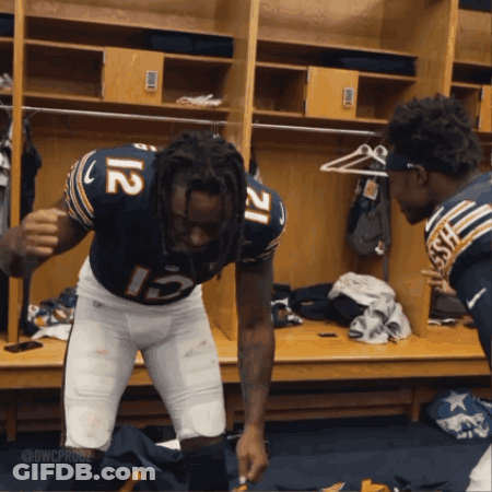 Football Player In Locker Room Number 12 GIF