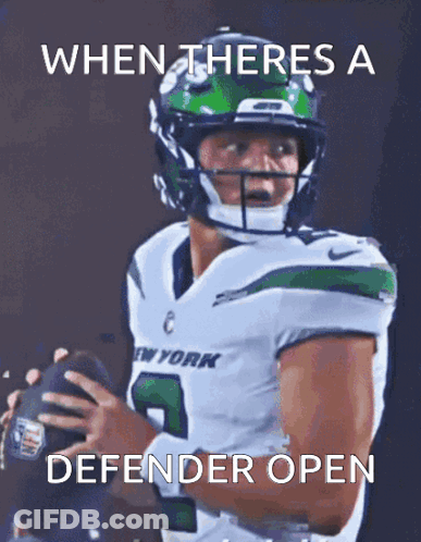 A Football Player In A New York Jersey Holds A Ball GIF