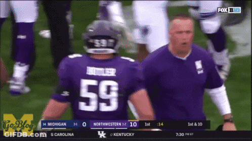 A Football Player In A Purple Jersey With The Number 59 On The Back GIF