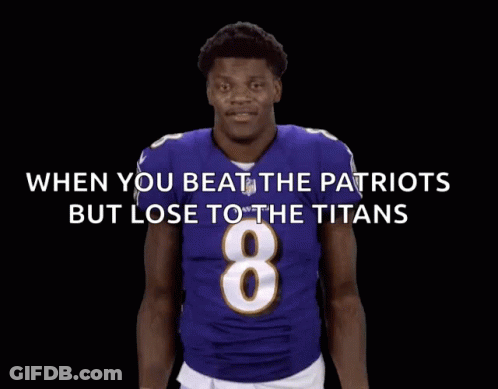 A Football Player In A Purple Jersey With The Number 8 GIF