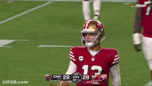 A Football Player In A Red Jersey With The Number 13 On It GIF