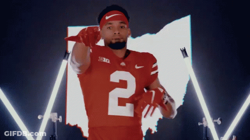 A Football Player In A Red Jersey With The Number 2 On It GIF