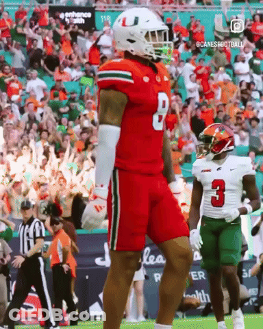 A Football Player In A Red Jersey With The Number 8 On It GIF