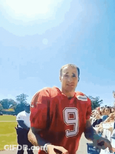 A Football Player In A Red Jersey With The Number 9 On It GIF