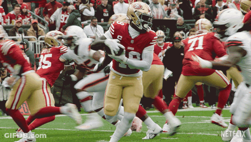 A Football Player In A Red Uniform With The Number 10 On It GIF