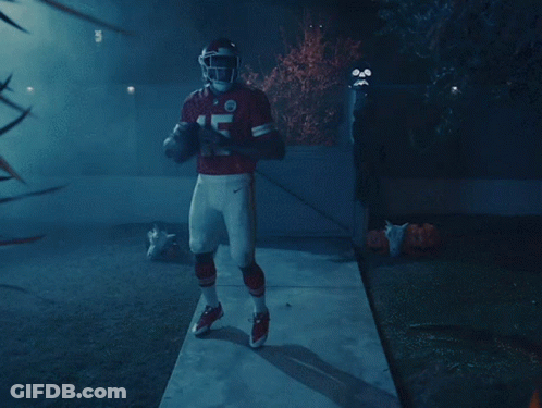 A Football Player In A Red Uniform With The Number 7 On It GIF