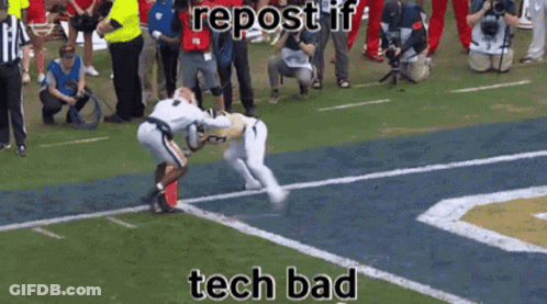 A Football Player Is Being Tackled By Another Player On A Field With The Caption Tech Bad GIF