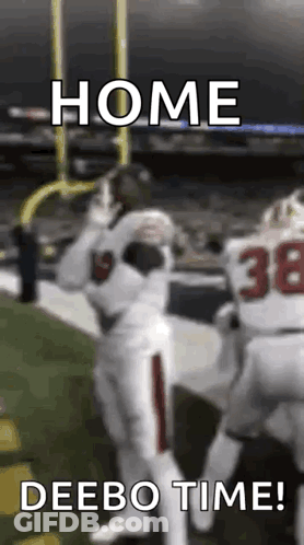 A Football Player Is Catching A Ball On A Field With The Caption `` Home Deebo Time '' . GIF