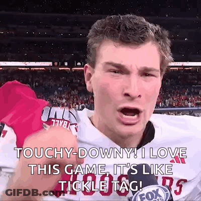 A Football Player Is Giving A Tickle Tag During A Game GIF