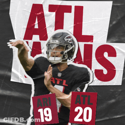 A Football Player Is Holding Up A Sign That Says Atl 20 GIF