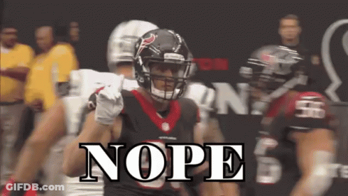 A Football Player Is Pointing At The Camera With The Word Nope Below Him GIF