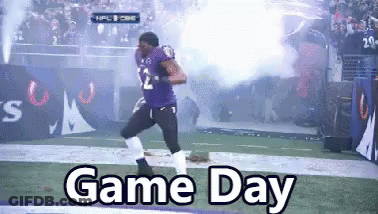 A Football Player Is Running On A Field With The Words Game Day Written Below Him GIF