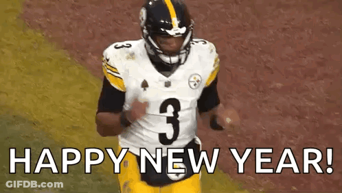 A Football Player Is Running On A Field With The Words `` Happy New Year '' . GIF