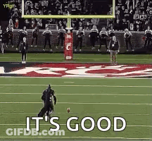 A Football Player Is Running With A Ball On A Field And The Words `` It 'S Good '' Are Visible . GIF