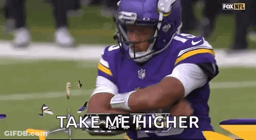 A Football Player Is Sitting On The Field With His Arms Crossed And The Words Take Me Higher Written Above Him . GIF
