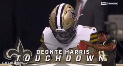 A Football Player Named Deonte Harris Touchdown Is Holding A Football GIF
