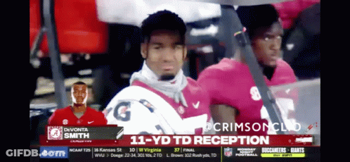 A Football Player Named Divonta Smith Is On A TV Screen GIF