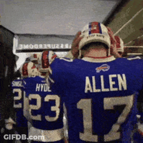 A Football Player Wearing A Blue Jersey That Says Allen 17 GIF