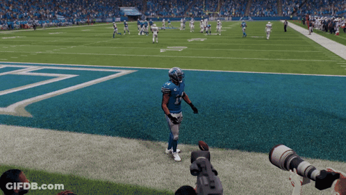 A Football Player Wearing A Blue Jersey With The Number 1 On It GIF
