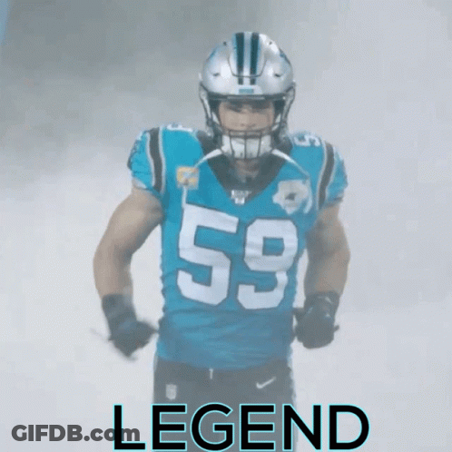 A Football Player Wearing A Blue Jersey With The Number 59 On It GIF