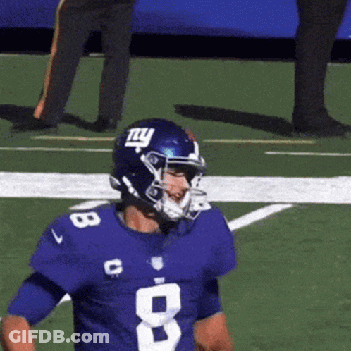 A Football Player Wearing A Blue Jersey With The Number 8 GIF