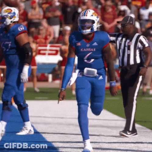 A Football Player Wearing A Blue Kansas Jersey GIF