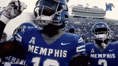 A Football Player Wearing A Blue Memphis Jersey GIF