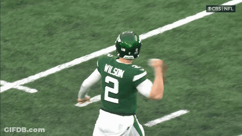 A Football Player Wearing A Green Jersey With The Number 2 On It GIF