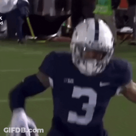A Football Player Wearing A Helmet And A Jersey With The Number 3 On It Is Running On The Field . GIF