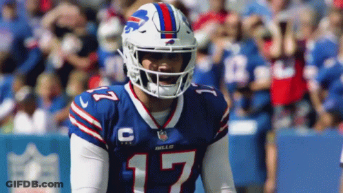 A Football Player Wearing A Helmet And Jersey With The Number 17 On It GIF