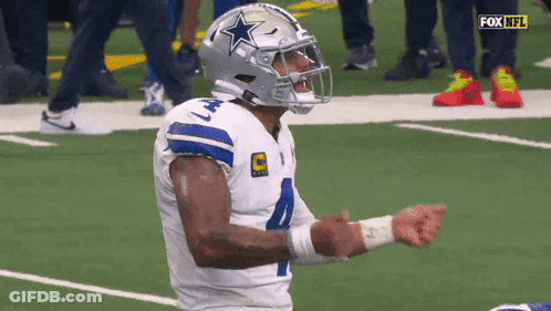 A Football Player Wearing A Helmet That Has A Star On It GIF