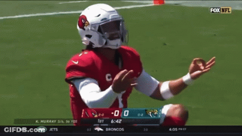A Football Player Wearing A Helmet That Says Cardinals On It GIF