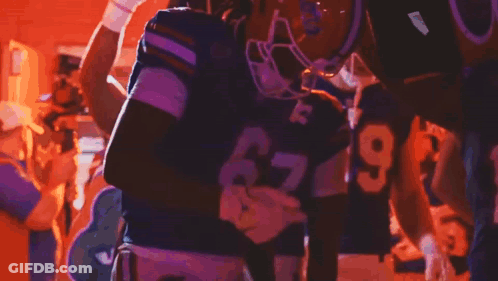 A Football Player Wearing A Helmet That Says Gators On It GIF