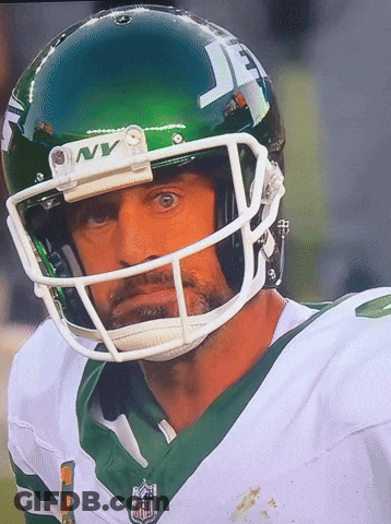 A Football Player Wearing A Helmet That Says Jets On It GIF
