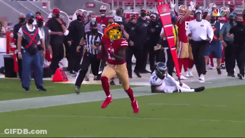 A Football Player Wearing A Helmet That Says ' NFL ' On It GIF