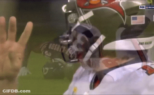 A Football Player Wearing A Helmet That Says Pro Falcons GIF